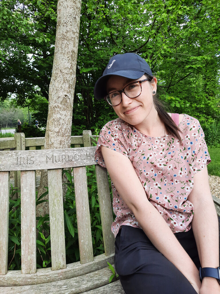 The inscription on the bench reads: “Iris Murdoch novelist and philosopher who with her husband loved and often visited the garden.”